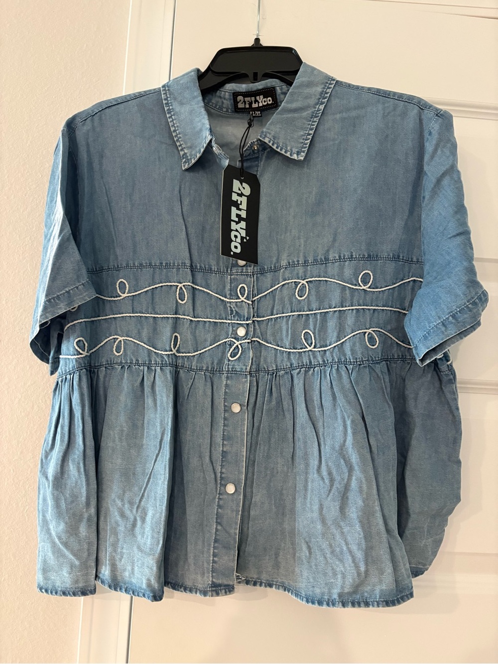 2FLYco. Denim pearl snap-Front Peplum Top - Light Blue
